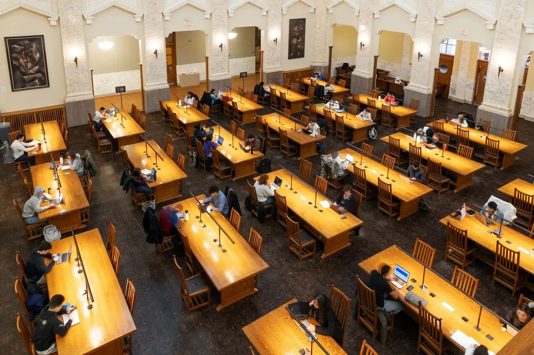 People working inside Carnegie Library.